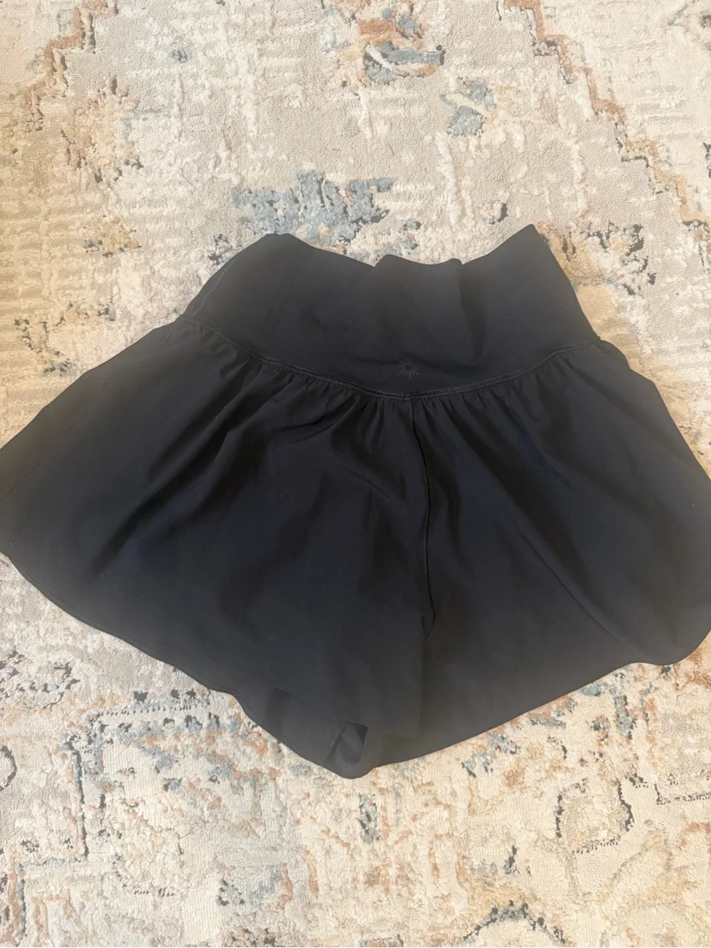 Women's Black High-Waist Athletic Shorts with Flared Hem